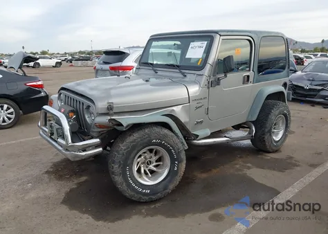 2000 Jeep Wrangler Sport z USA, uszkodzony, nr VIN 1J4FA49S7YP742444